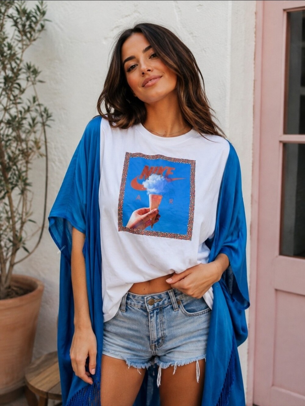 Upcycled Nike Air Women's Blue and White Top